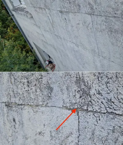 Gros plan d'une trame visible sous une peinture I4 fissurée